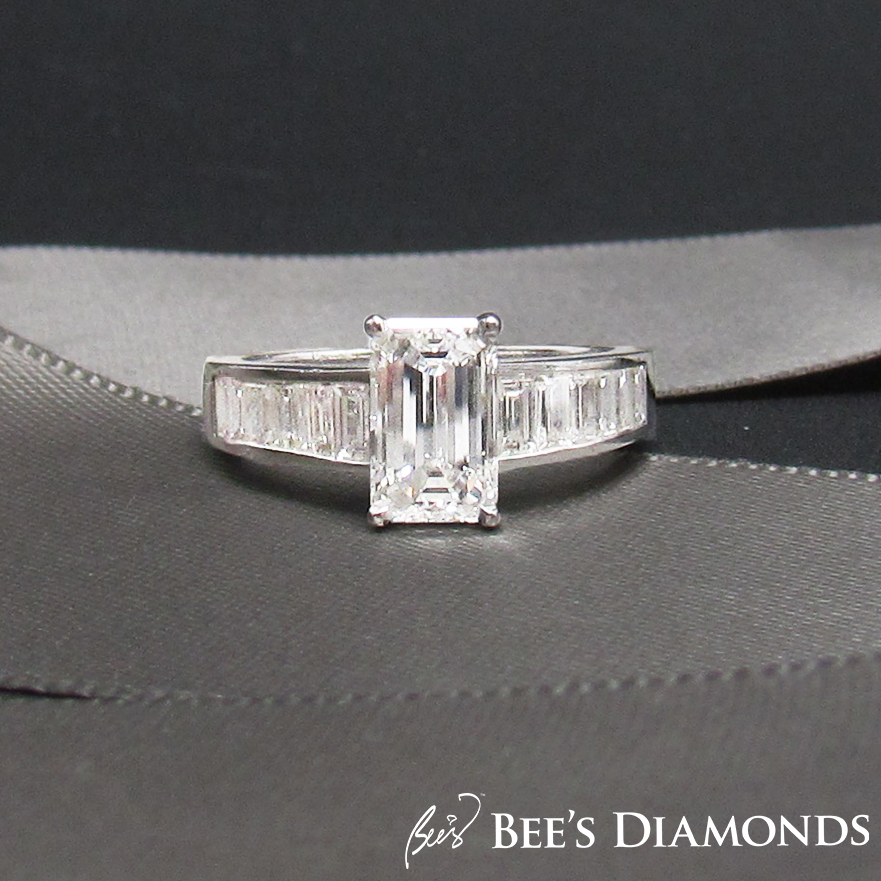 Crisscut diamond engagement ring with small baguettes