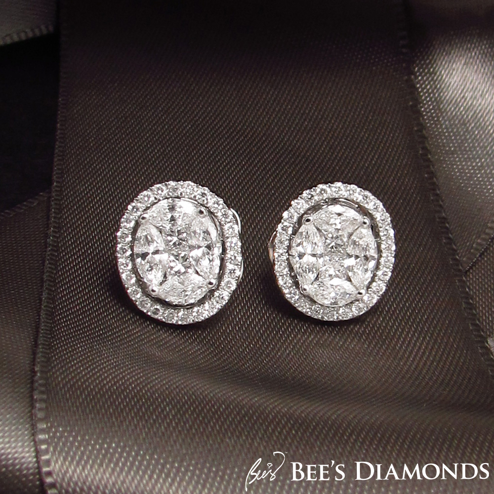Invisible setting, large looking oval diamond earrings