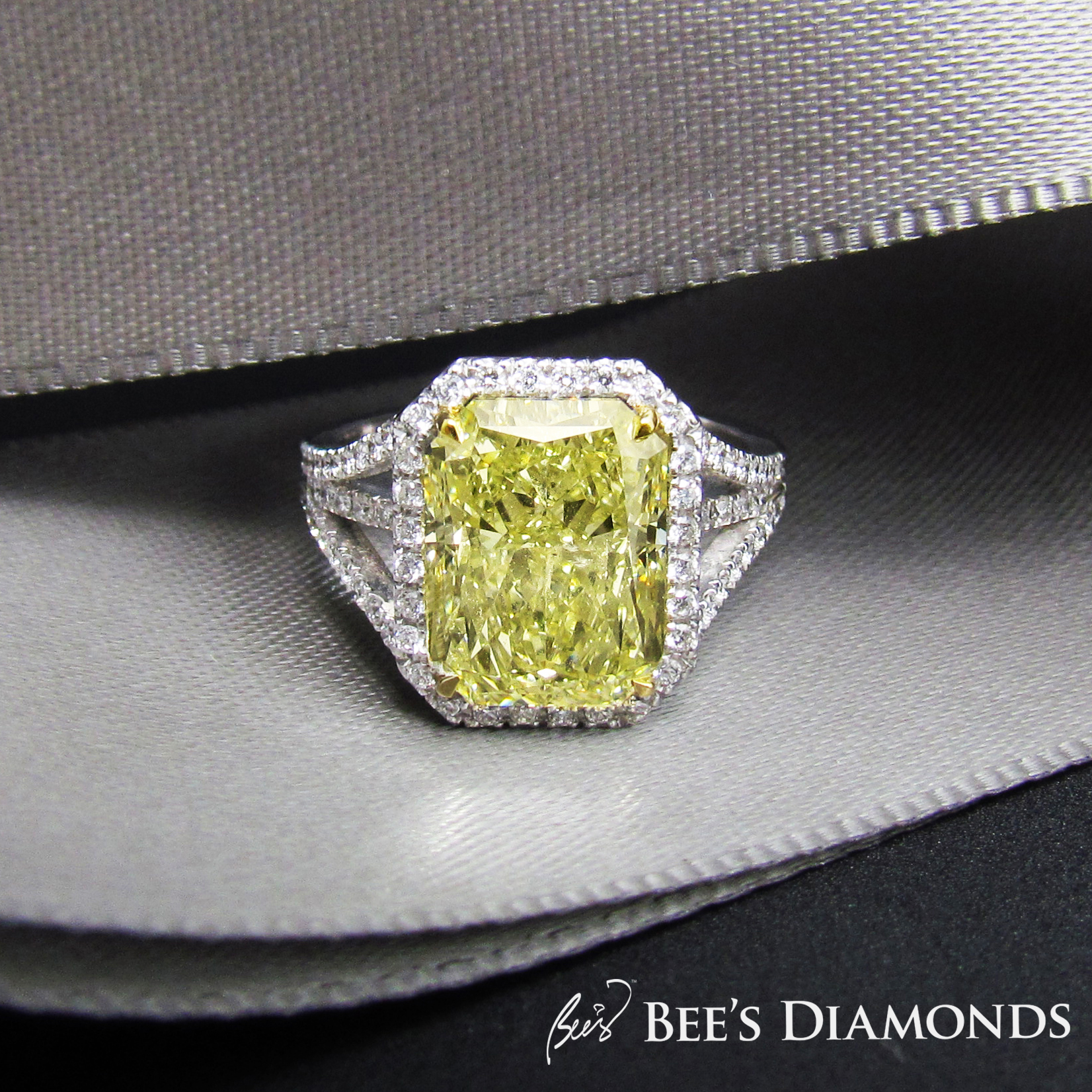 Large radiant cut fancy yellow diamond ring with GIA certificate
