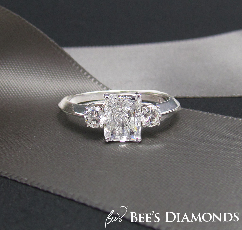 Radiant cut diamond three stones engagement ring | Bee's Diamonds