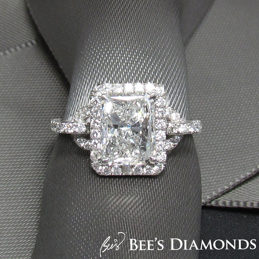 Radiant cut diamond engagement ring | Love locks on the side