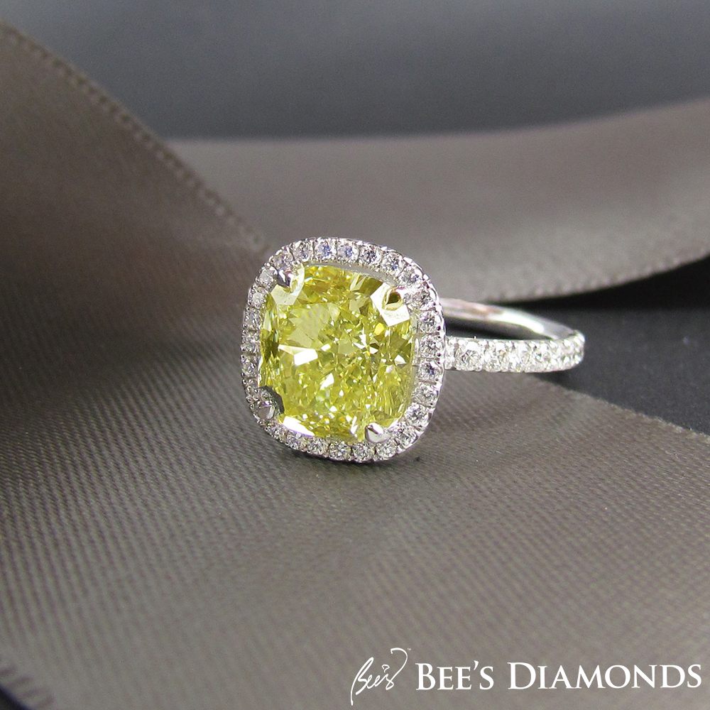 Cushion cut, fancy yellow diamond ring with GIA certificate
