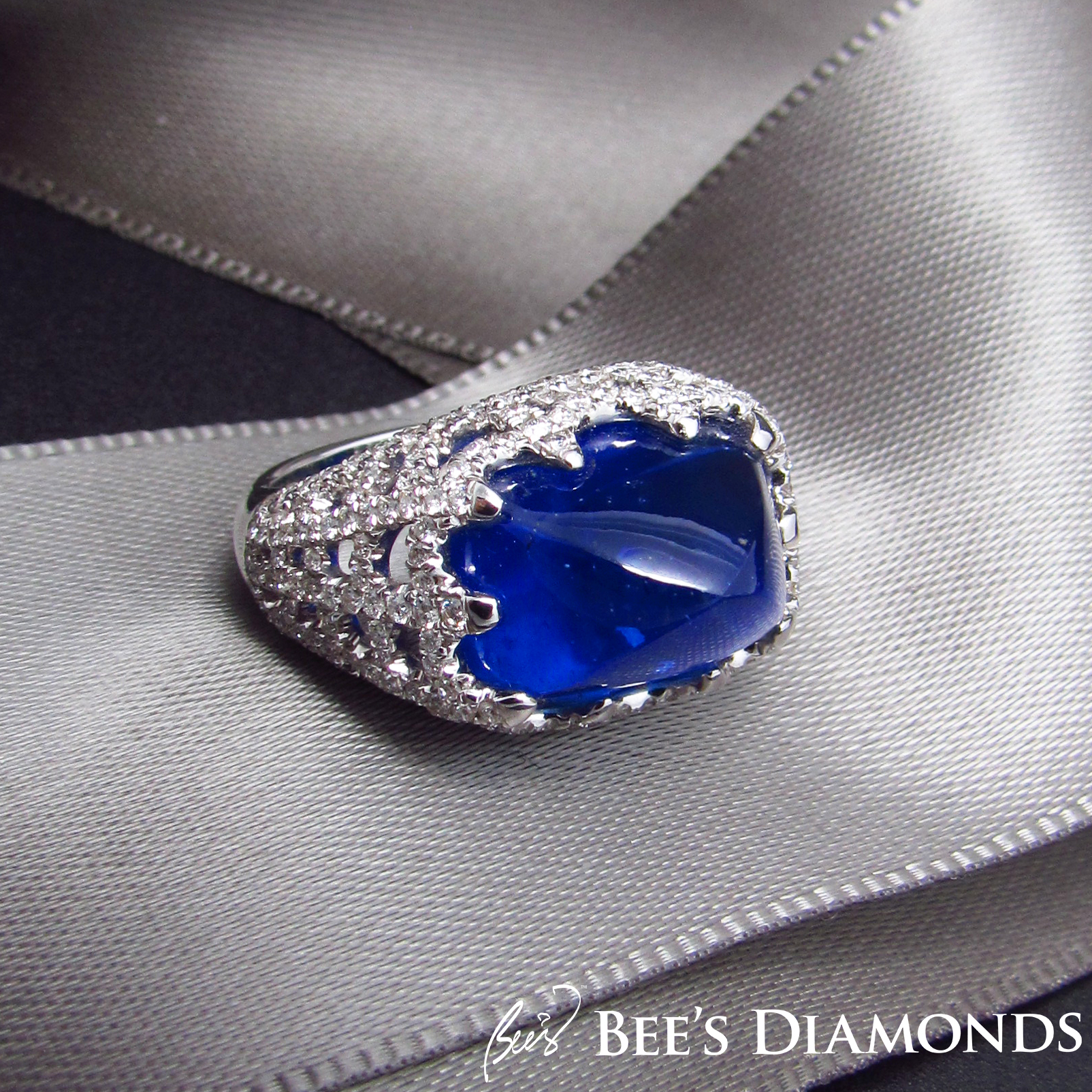 Sapphire sugar loaf ring with small diamonds spider | Bee's Diamonds